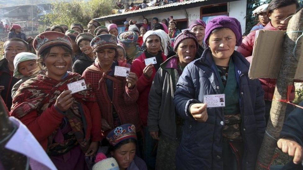 people are showing their voting card